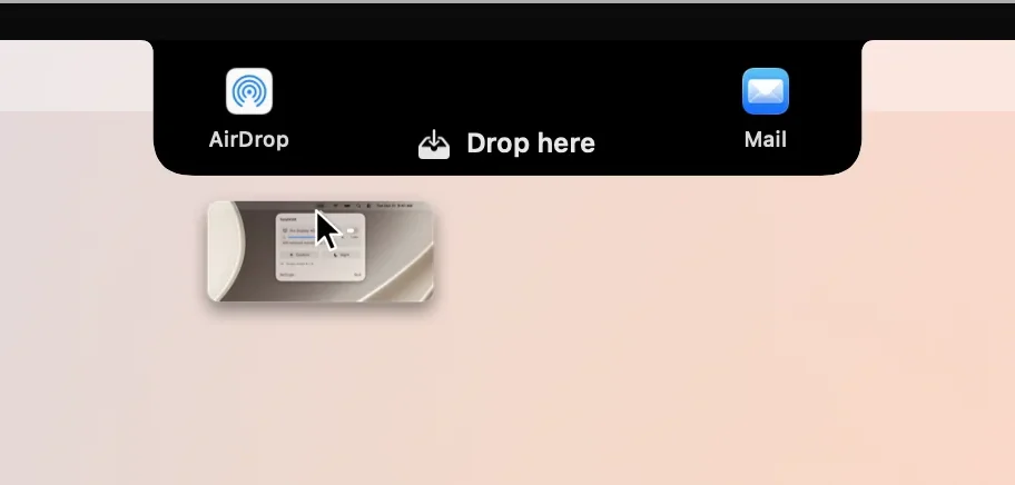 Destinos de AirDrop y Mail junto al notch mientras se arrastra un archivo